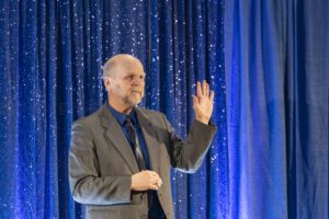 Bob Miller raising hand